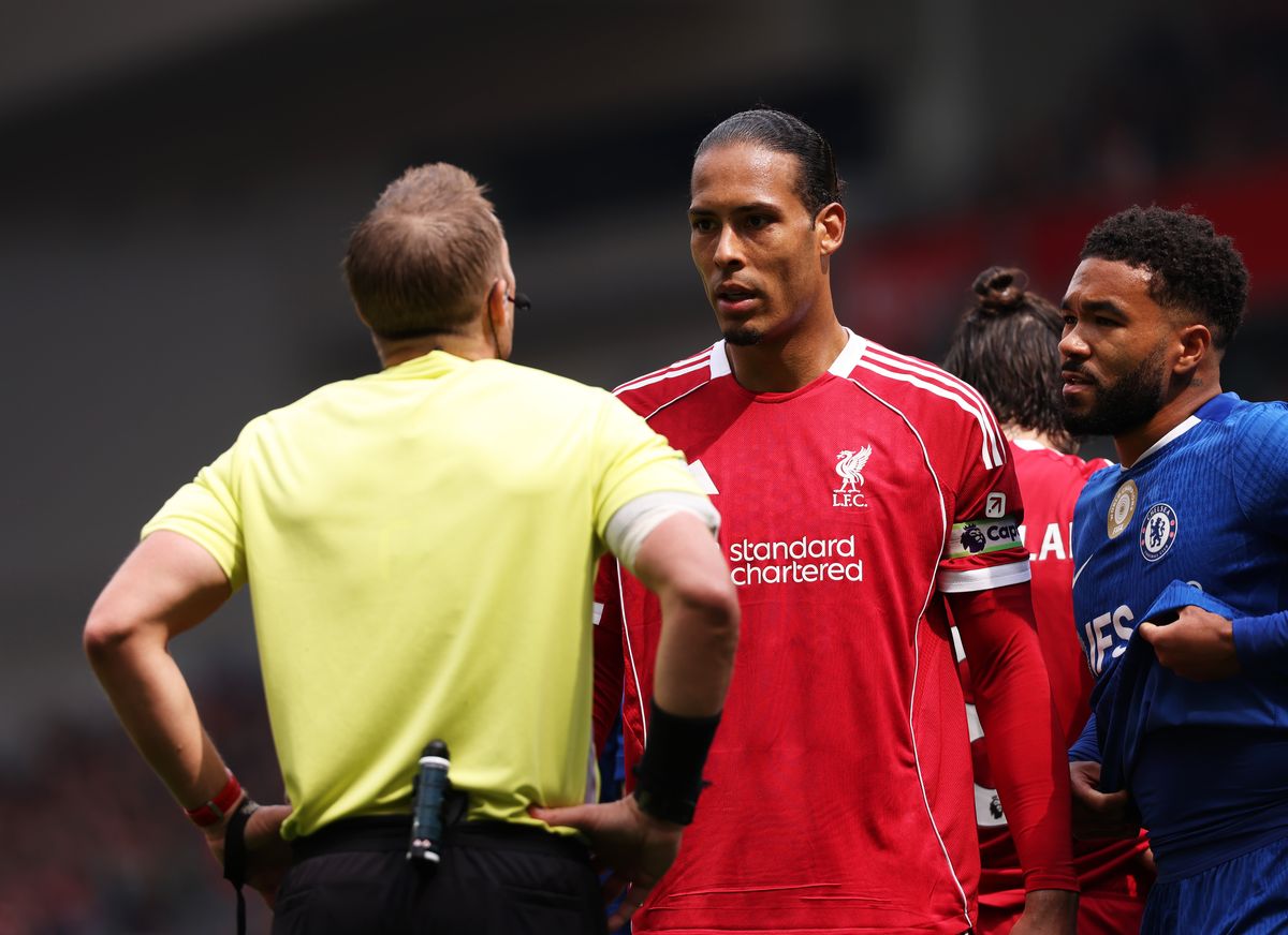 Virgil van Dijk and referee Craig Pawson during the Premier League game between Liverpool and Chelsea.
