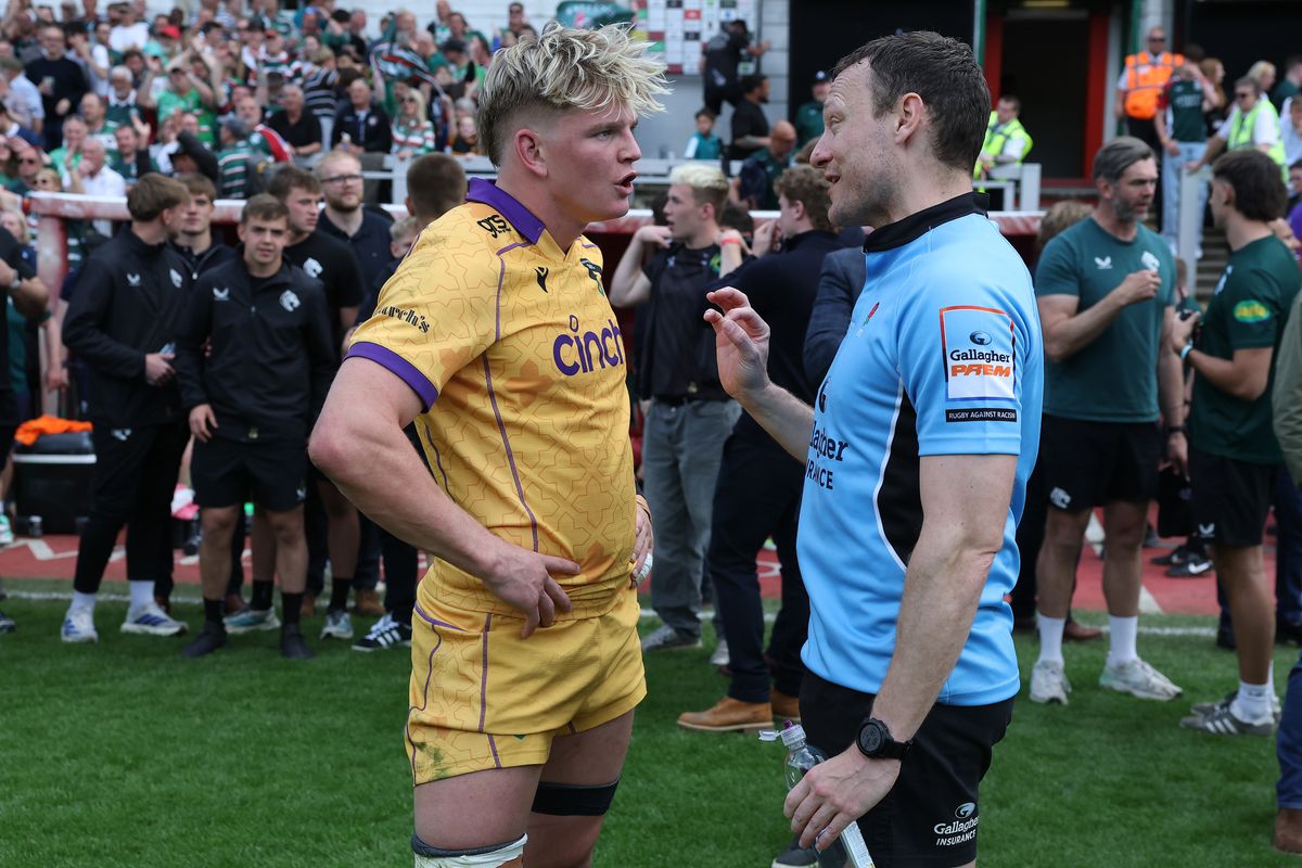 Henry Pollock of Northampton Saints talks with referee, Matthew Carley
