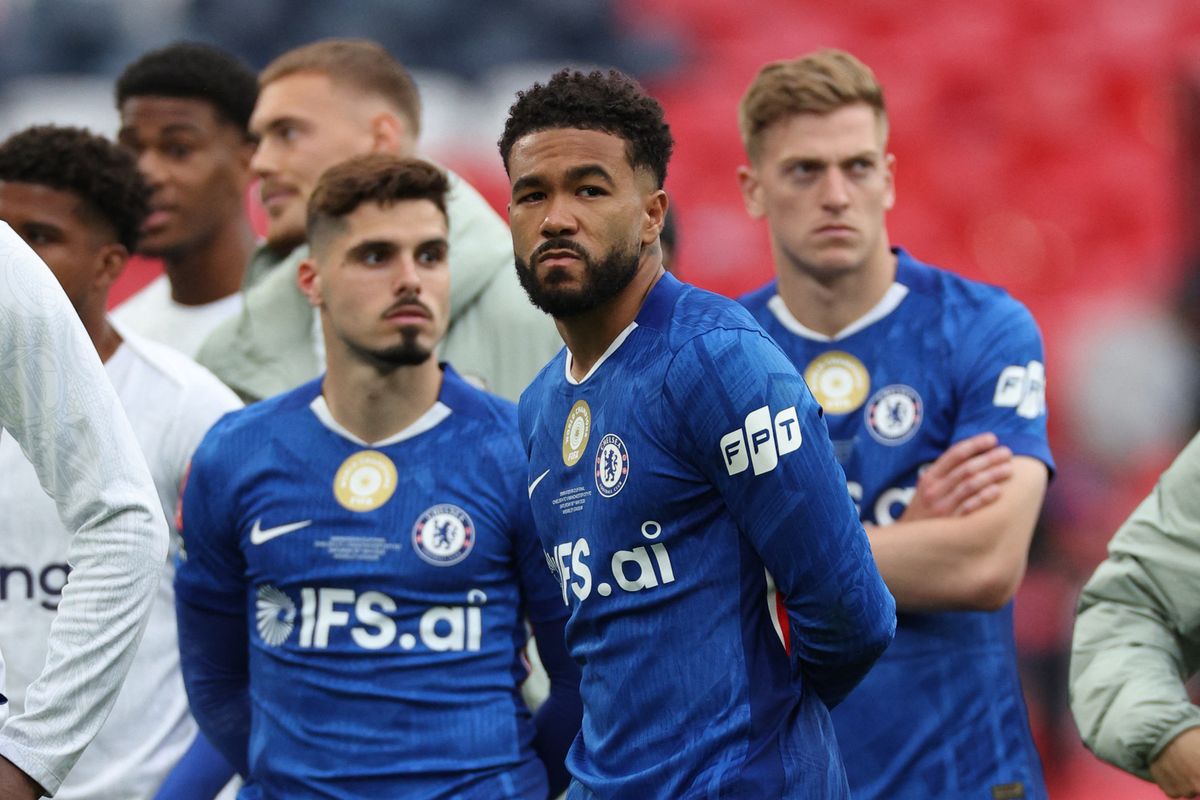 Chelsea players react after losing to Manchester City in the FA Cup final