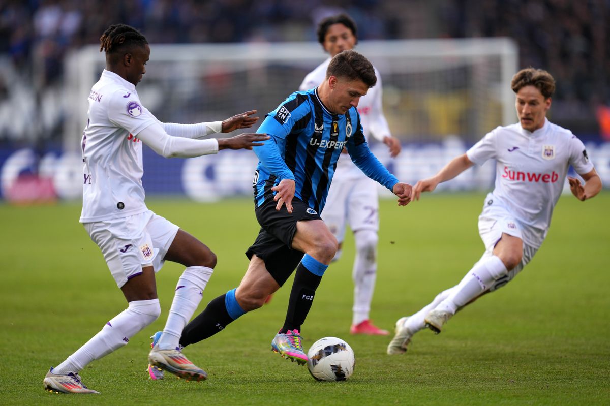 Christos Tzolis (centre) of Club Brugge