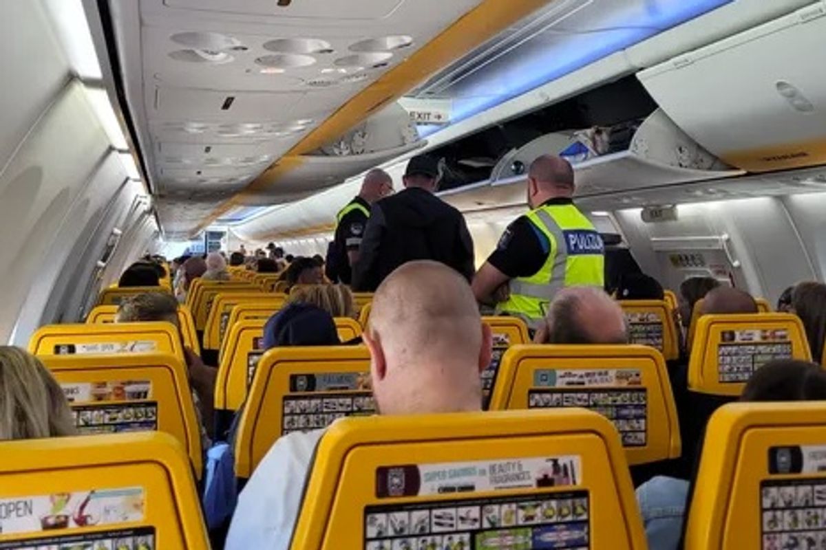 Police onboard the Ryanair flight from Liverpool John Lennon Airport to Malta