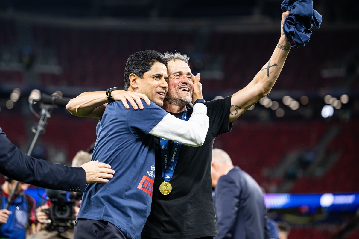 PSG manager Luis Enrique celebrates victory with president Nasser Al-Khelaifi