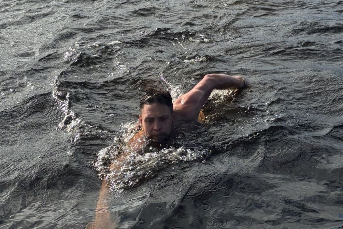 Sam Macalpine Peyre, 32, swimming outdoors