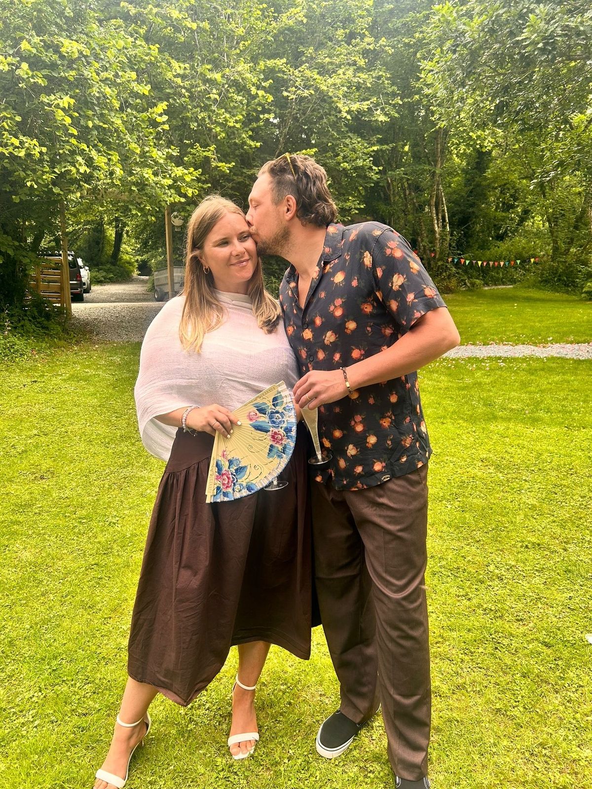 Georgia Mcalpine Peyr, left, with husband Sam, right