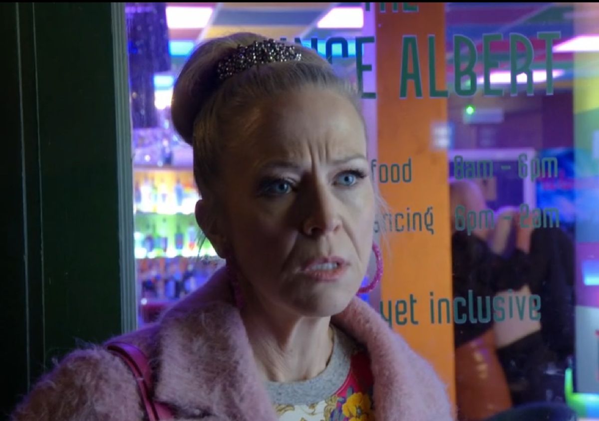 Linda stands outside of the prince albert in Eastenders