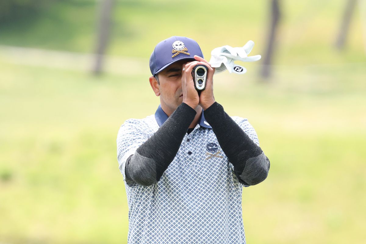 Anirban Lahiri looking through his rangefinder