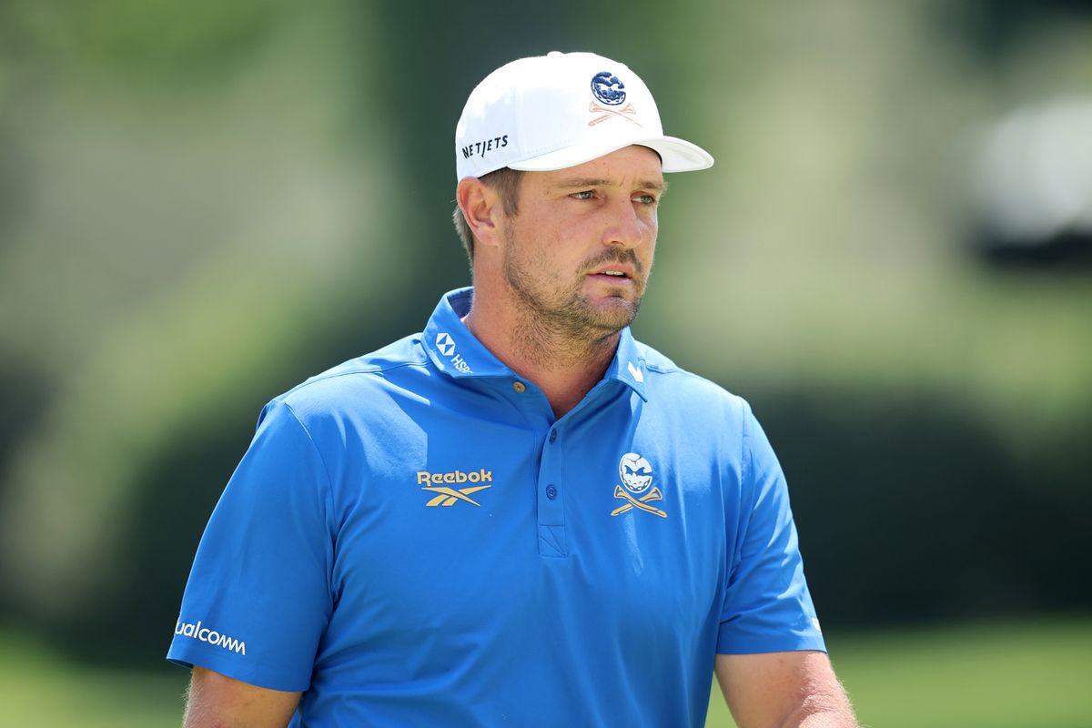 Bryson DeChambeau looks on
