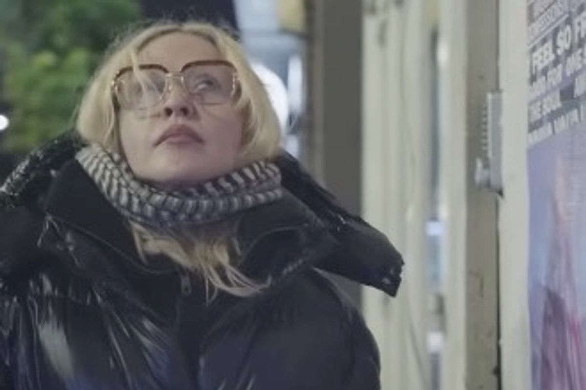 Madonna filmed herself putting up album posters in Shoreditch