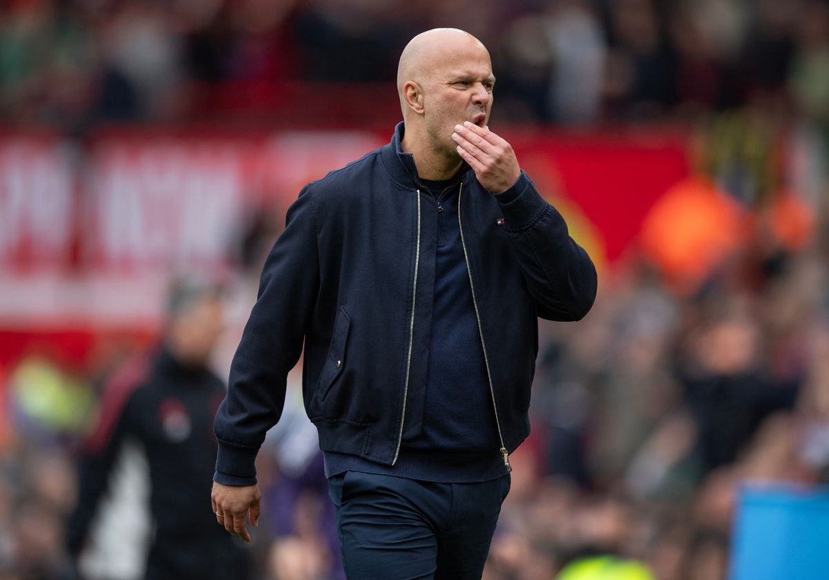 Liverpool manager Arne Slot walks back to the changing room after the Premier League defeat to Manchester United