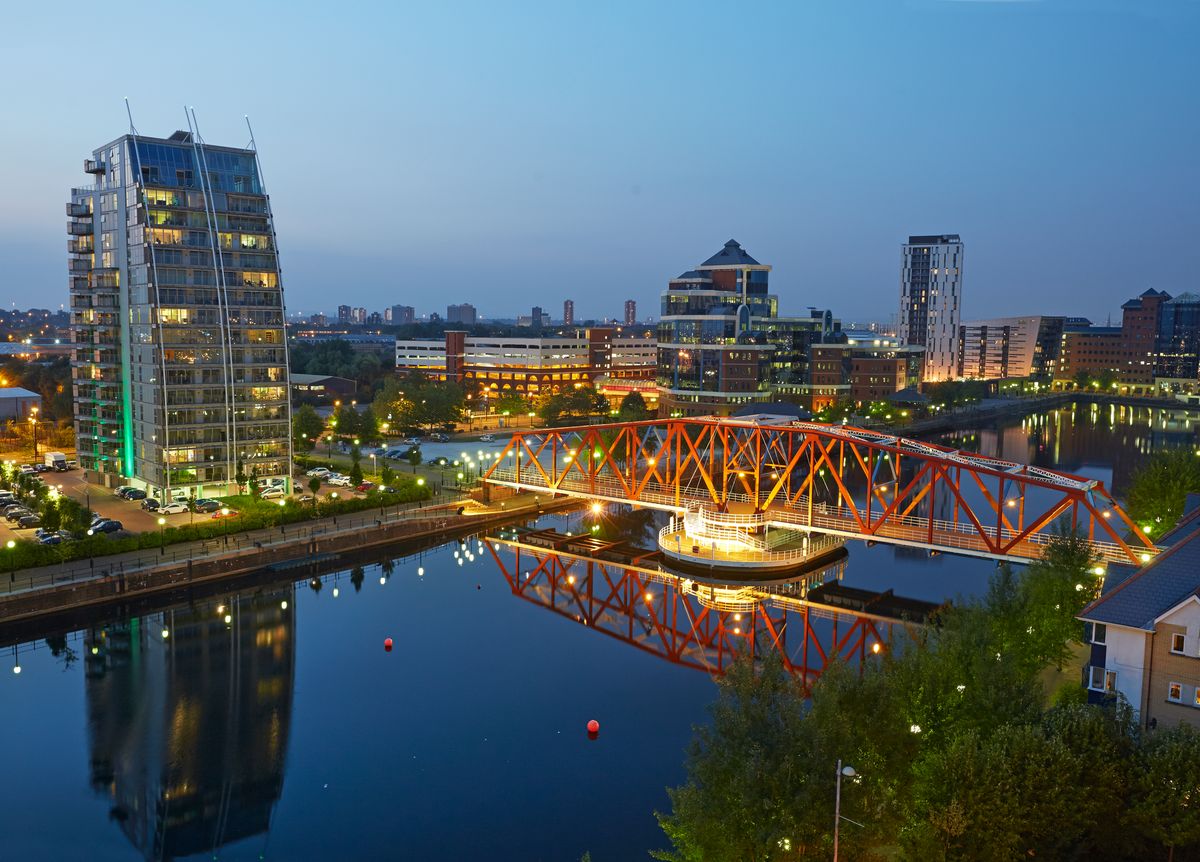 Elevated view of red bridge at the Manchester ship canal in the regenerated Salford Quays, Manchester