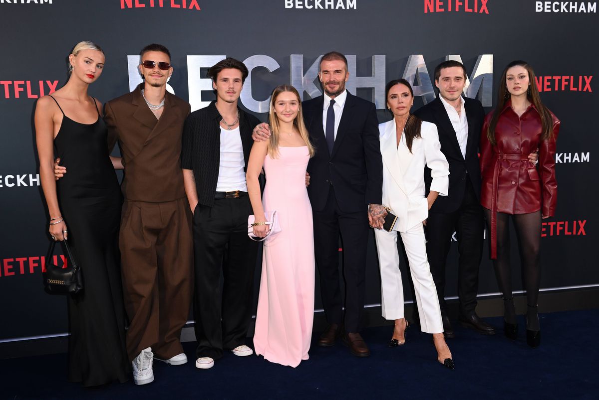 LONDON, ENGLAND - OCTOBER 03: (L-R) Mia Regan, Romeo Beckham, Cruz Beckham, Harper Beckham, David Beckham, Victoria Beckham, Brooklyn Beckham and Nicola Peltz attend the Netflix 'Beckham' UK Premiere at The Curzon Mayfair on October 03, 2023 in London, England. (Photo by Karwai Tang/WireImage)