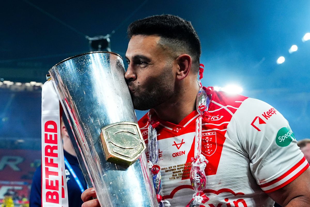 Hull KR's Rhyse Martin with the Super League trophy at Old Trafford. SWPix.