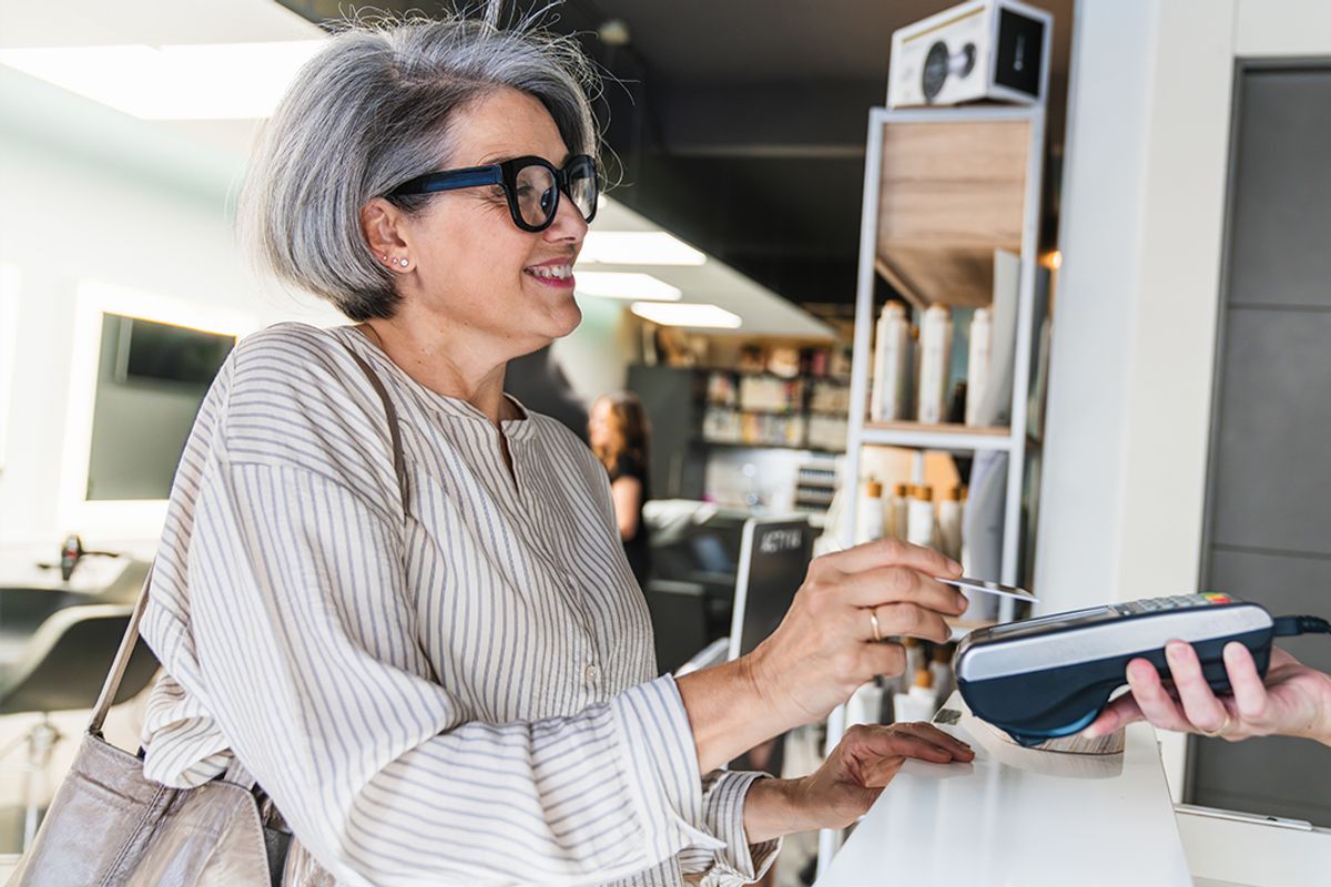 A woman making a payment