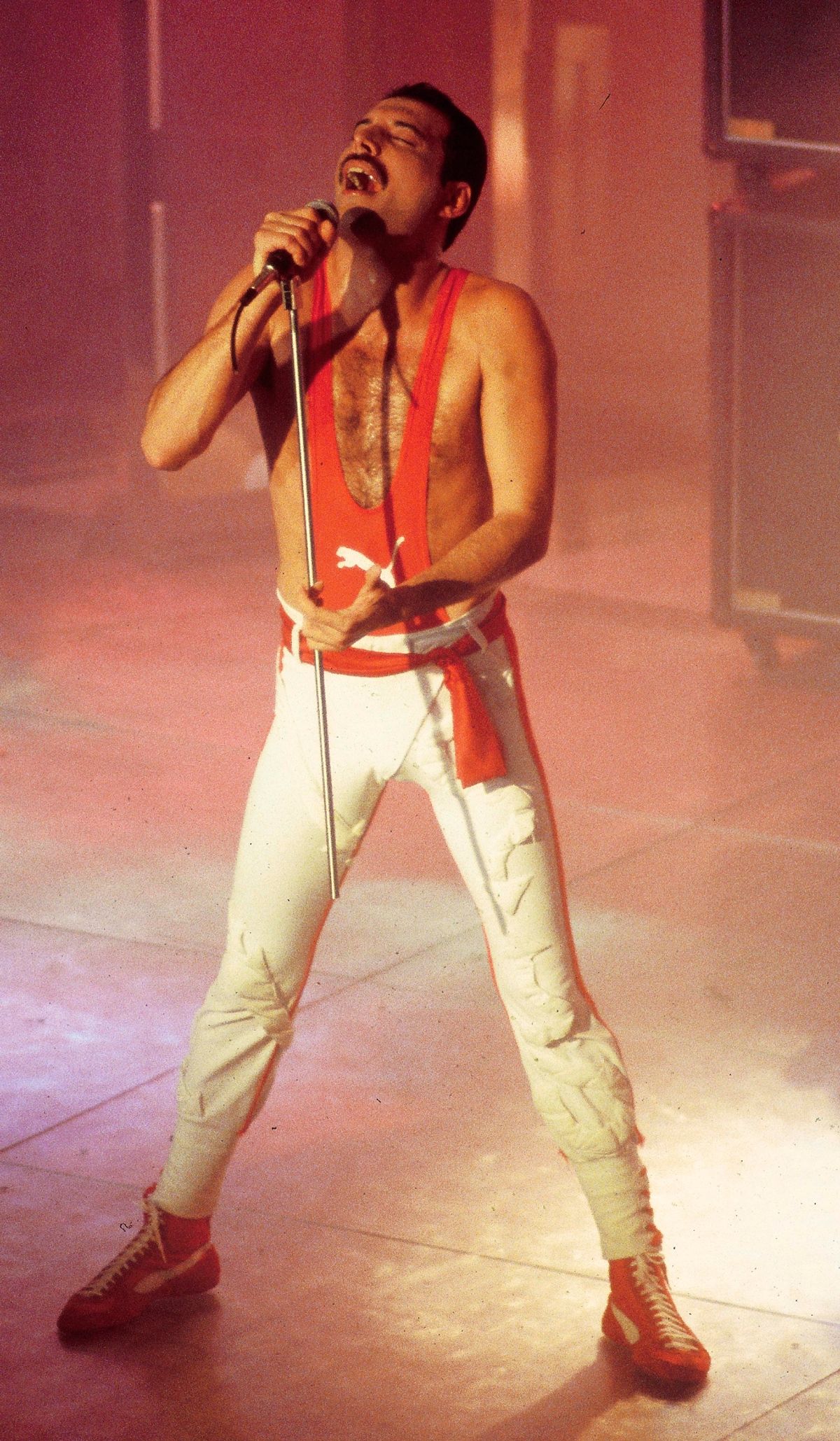 Singer Freddie Mercury (1946-1991) of English rock group Queen performs live on stage at the Golden Rose Pop Festival in Montreux, Switzerland on 12th May 1984.