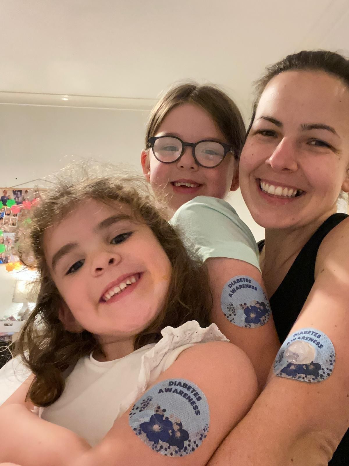 A woman with her daughters