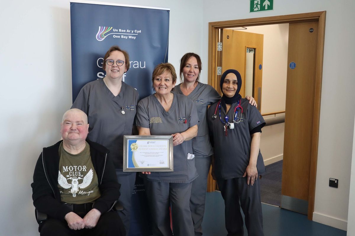 Leighton, left, with members of the MSK Spinal Team at Morriston Hospital in Swansea