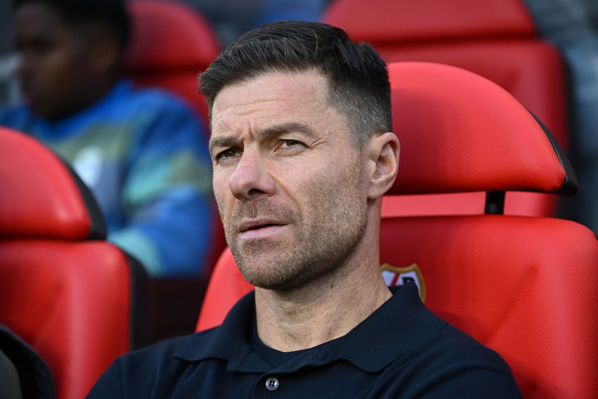 Liverpool legend Xabi Alonso looks on