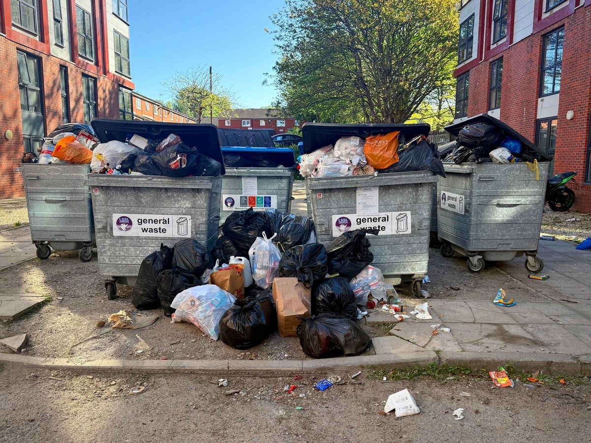 Rubbish piled up on a housing estate in Everton, just off Fox Street