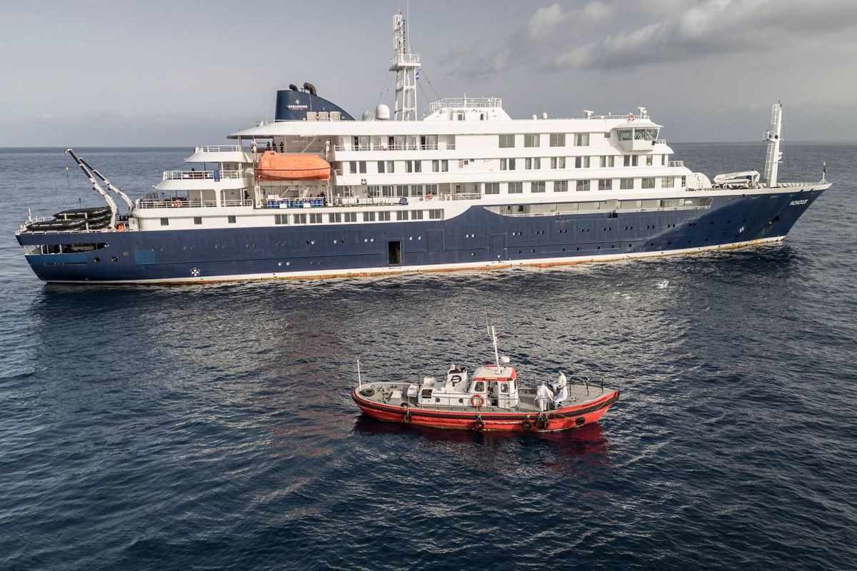 An ambulance boat arriving to help passengers on the MV Hondius