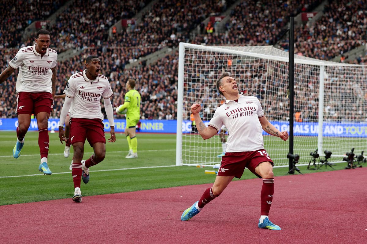 Leandro Trossard celebrates scoring during the Premier League match between West Ham United and Arsenal at the London Stadium. 