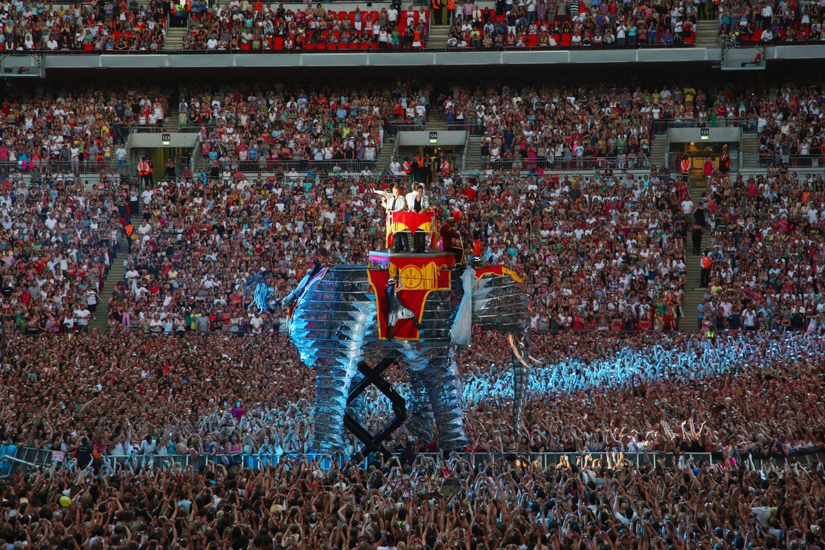Gary Barlow, Jason Orange, Howard Donald and Mark Owen of 'Take That' perform onstage for their 'Circus' tour held at Wembley Stadium on July 1, 2009 in London, England