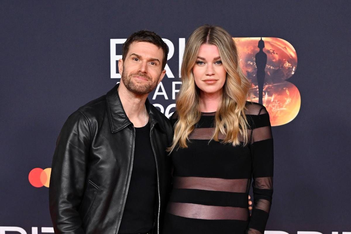 hannah and joel dommett in black on red carpet at brits