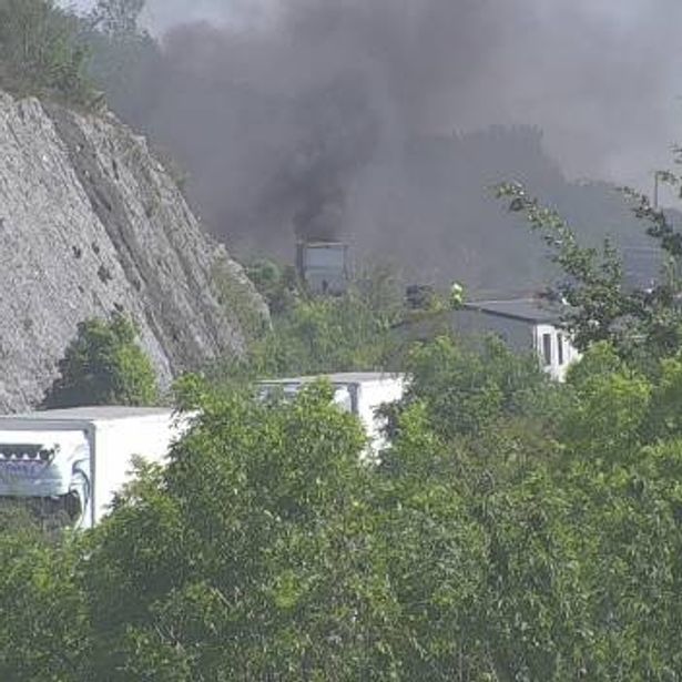 A vehicle fire is causing delays on the A55