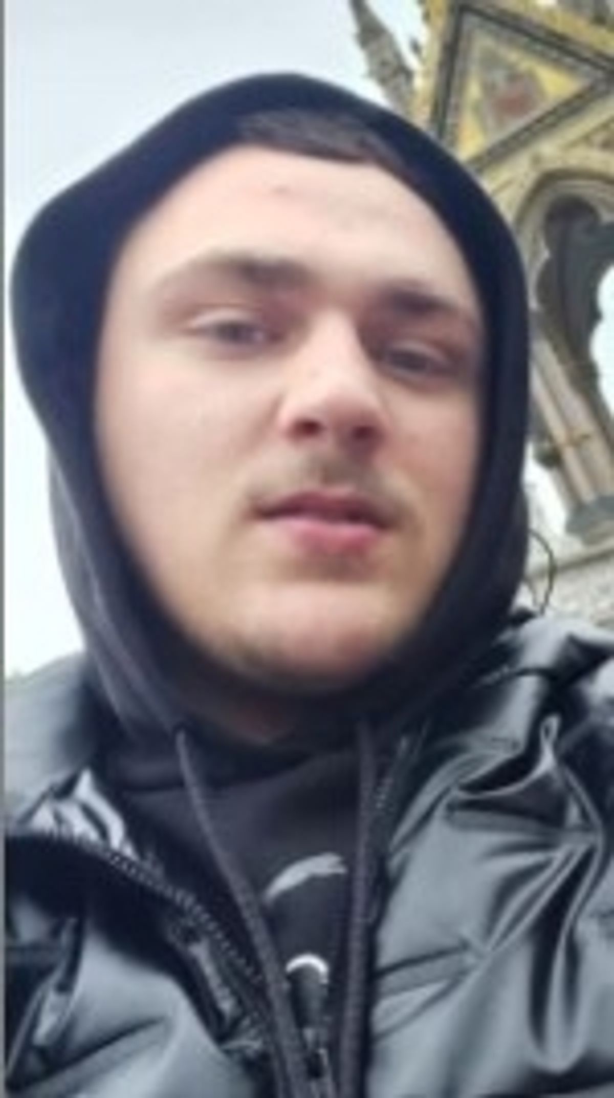 man in hooded coat