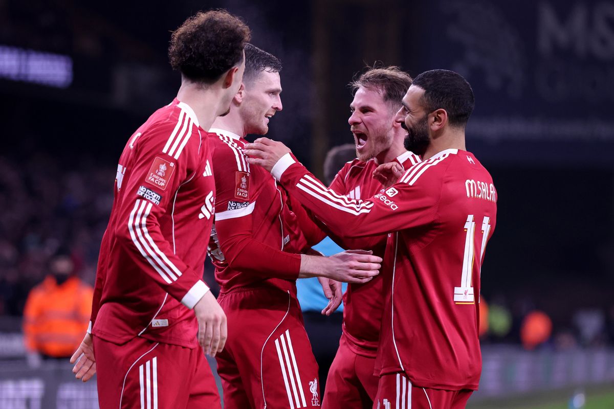 Andy Robertson of Liverpool celebrates scoring with teammates Curtis Jones, Alexis Mac Allister and Mohamed Salah