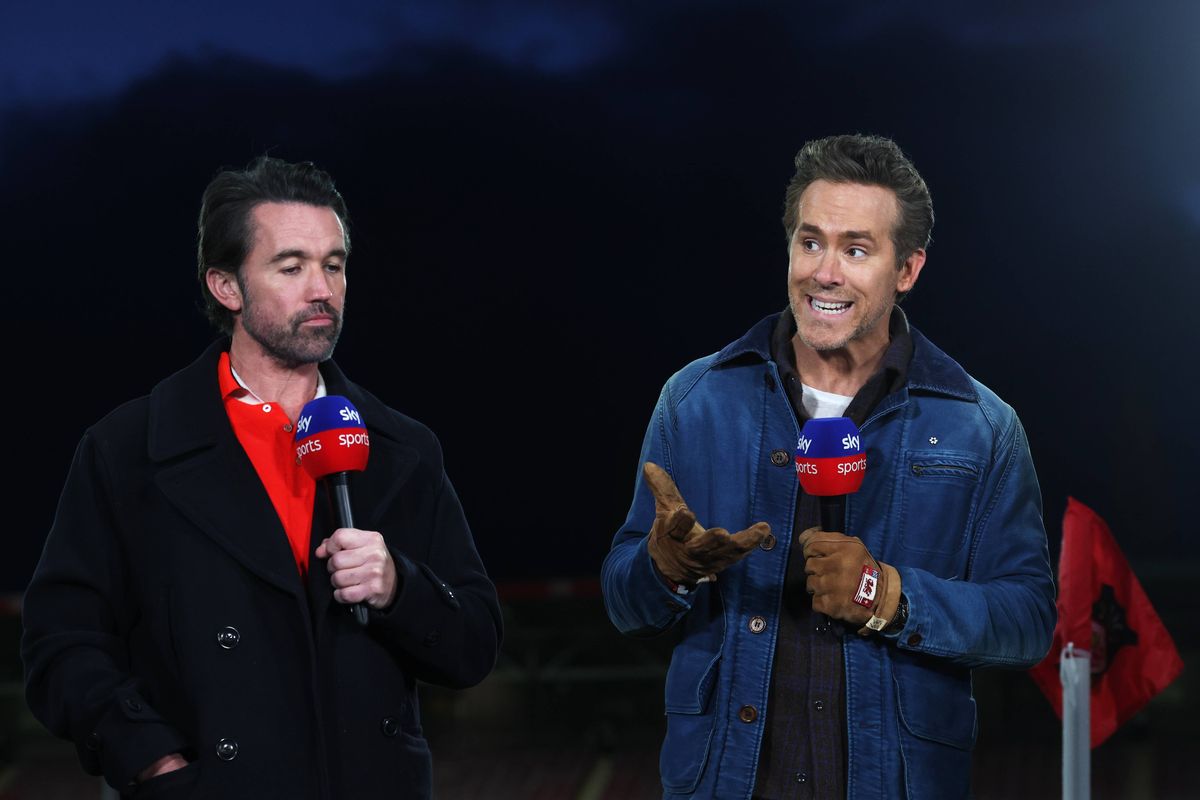 Rob McElhenney and Ryan Reynolds, co-owners of Wrexham are interviewed prior to the Sky Bet Championship match between Wrexham AFC and Swansea City at Racecourse Ground on March 13, 2026 in Wrexham, Wales. 