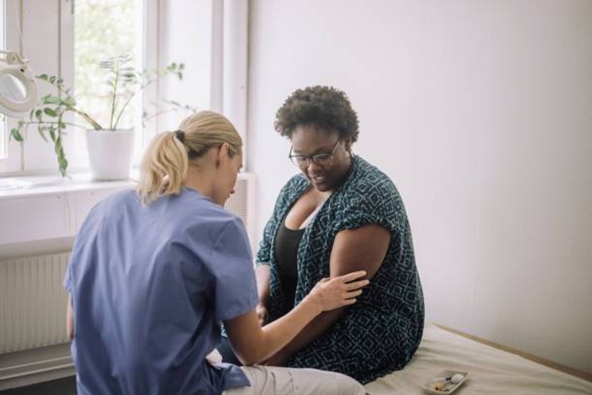 Older woman getting a blood test done