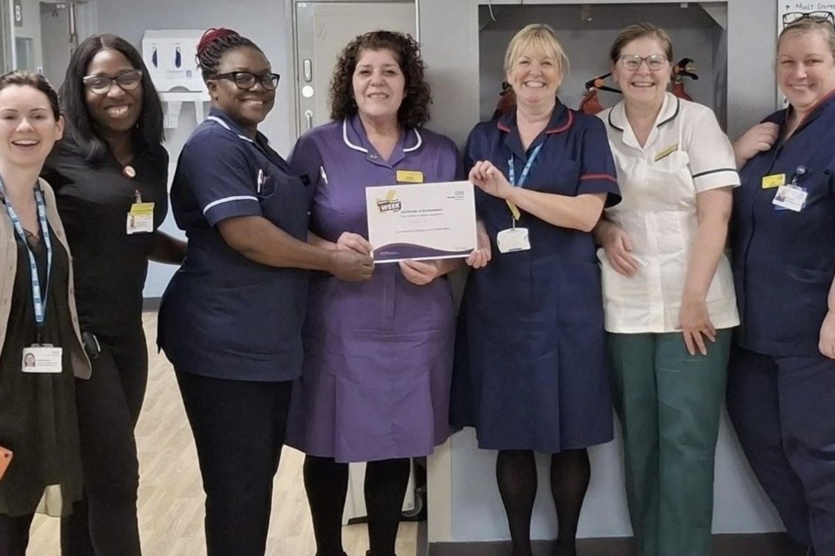 04/05/26 - A patient care navigator has been praised for her work making patient discharges more efficient on her ward. Theresa Prior, who works on Ward 27 at Scunthorpe General Hospital, received recognition from senior management and NHS England during the recent “Perfect Week” initiative. Theresa Prior (centre) being presented with a certificate of achievement during “Perfect Week” at Scunthorpe General Hospital.