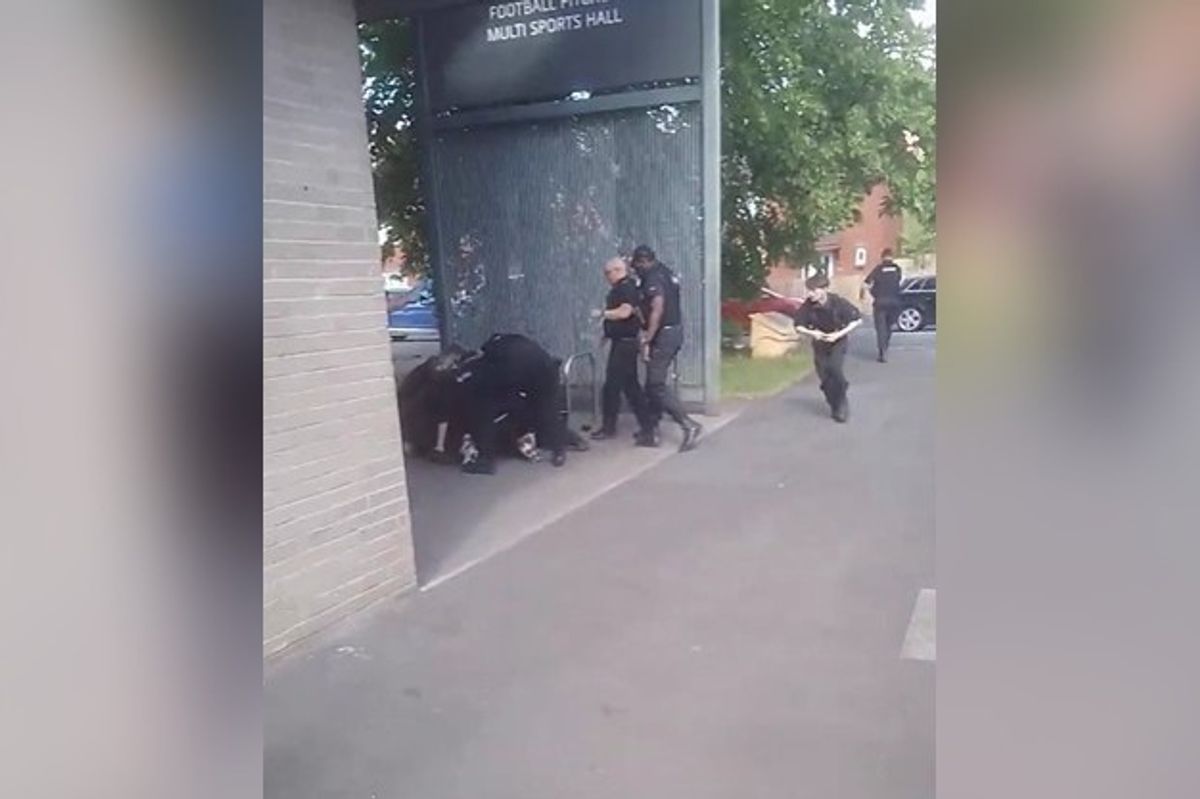 Emergency services pounce on an individual outside Denmark Road Sports Centre