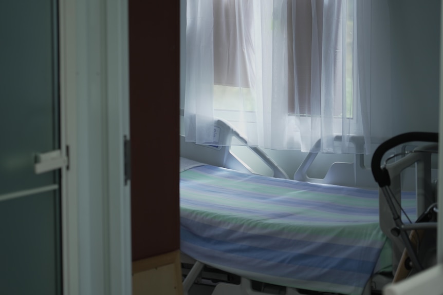 A hospital electrical bed at the home of an elderly resident.