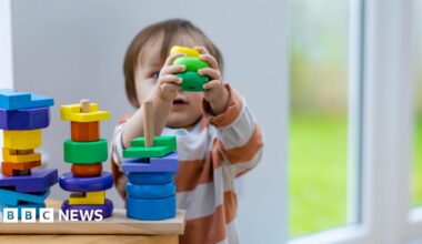 A child plays with building blocks