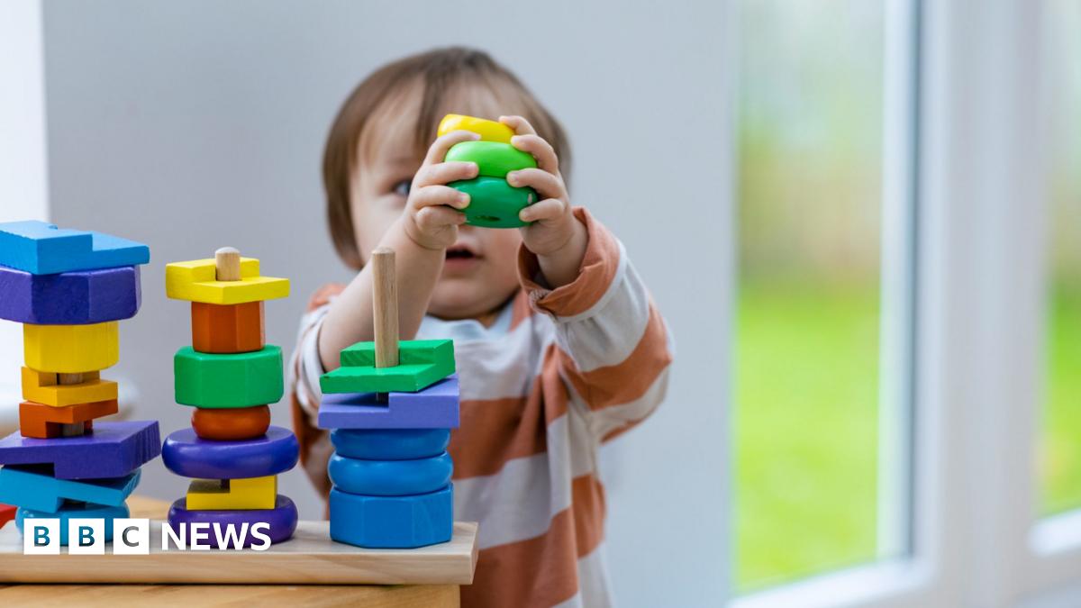 A child plays with building blocks