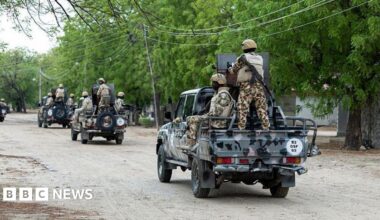 Nigerian soldiers from the Multinational Joint Task Force (MNJTF) drive around in pick-ups during training at the MNJTF military base, Sector 3 Headquarters, in Monguno, Borno state, Nigeria, on July 5, 2025.