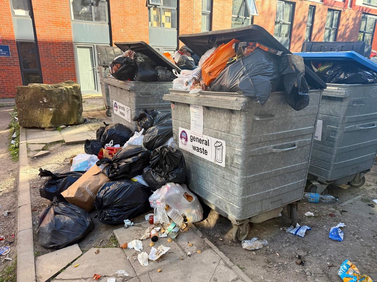 Rubbish piled up on a housing estate in Everton, just off Fox Street