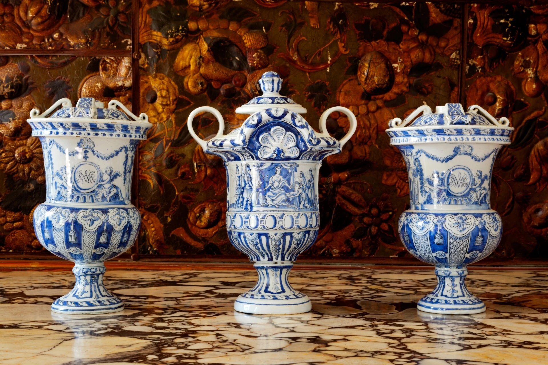 A group of Delftware urns at Dyrham Park, Gloucestershire