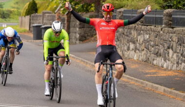 Drew McKinley (48) seizes the day and yellow jersey in Derry