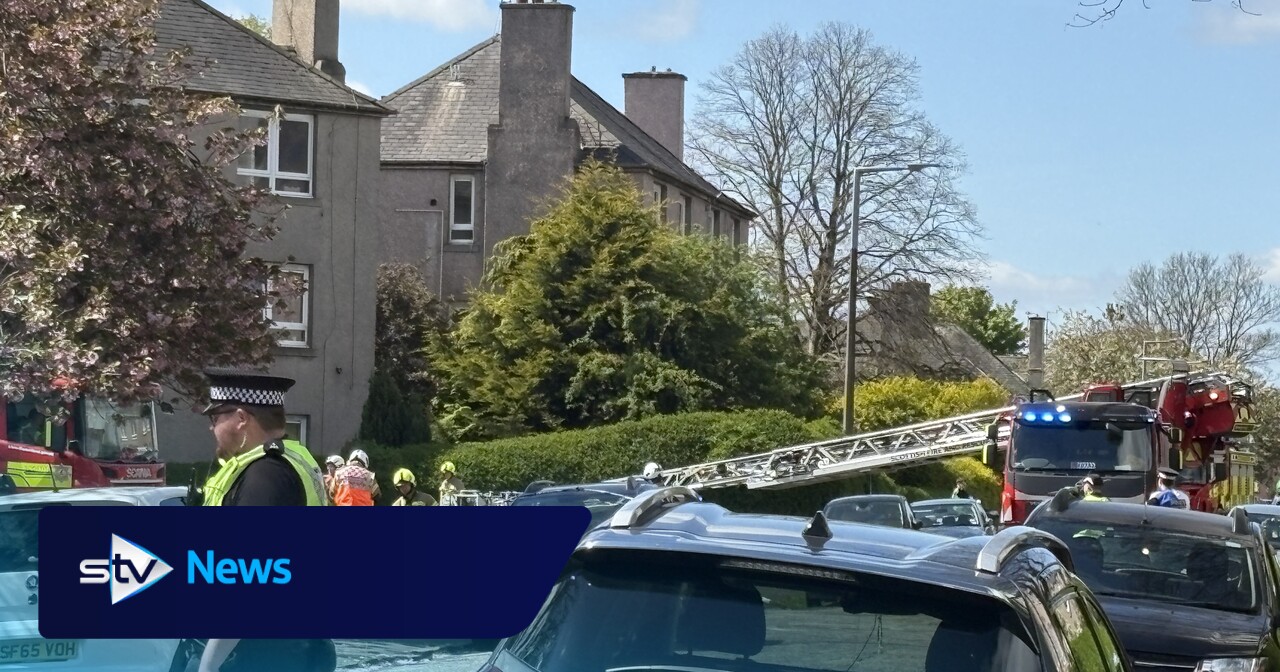 Firefighters battle blaze at Edinburgh block of flats as roads closed