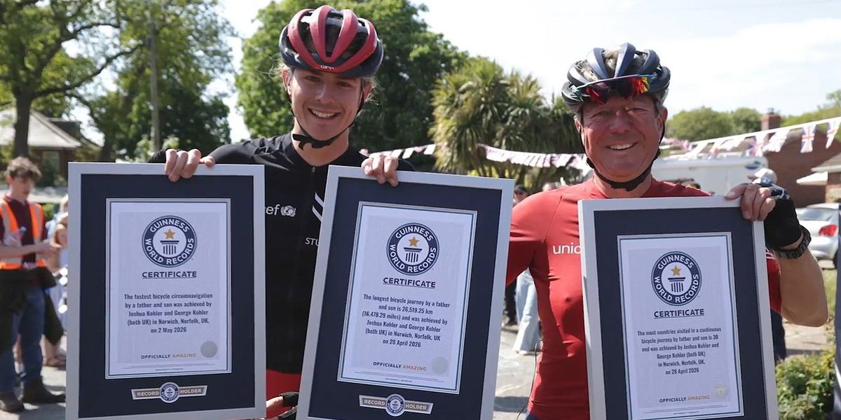 Father-son duo break THREE world records after cycling 18,000 miles around the globe for charity