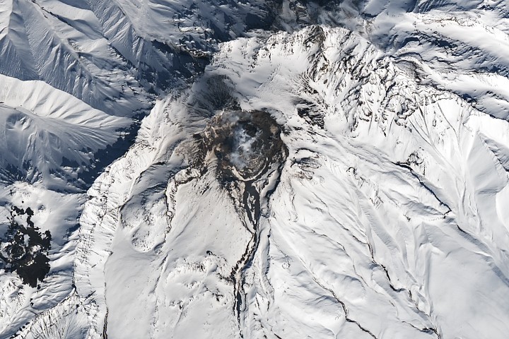 Melting Snow Off Shivelyuch - NASA Science