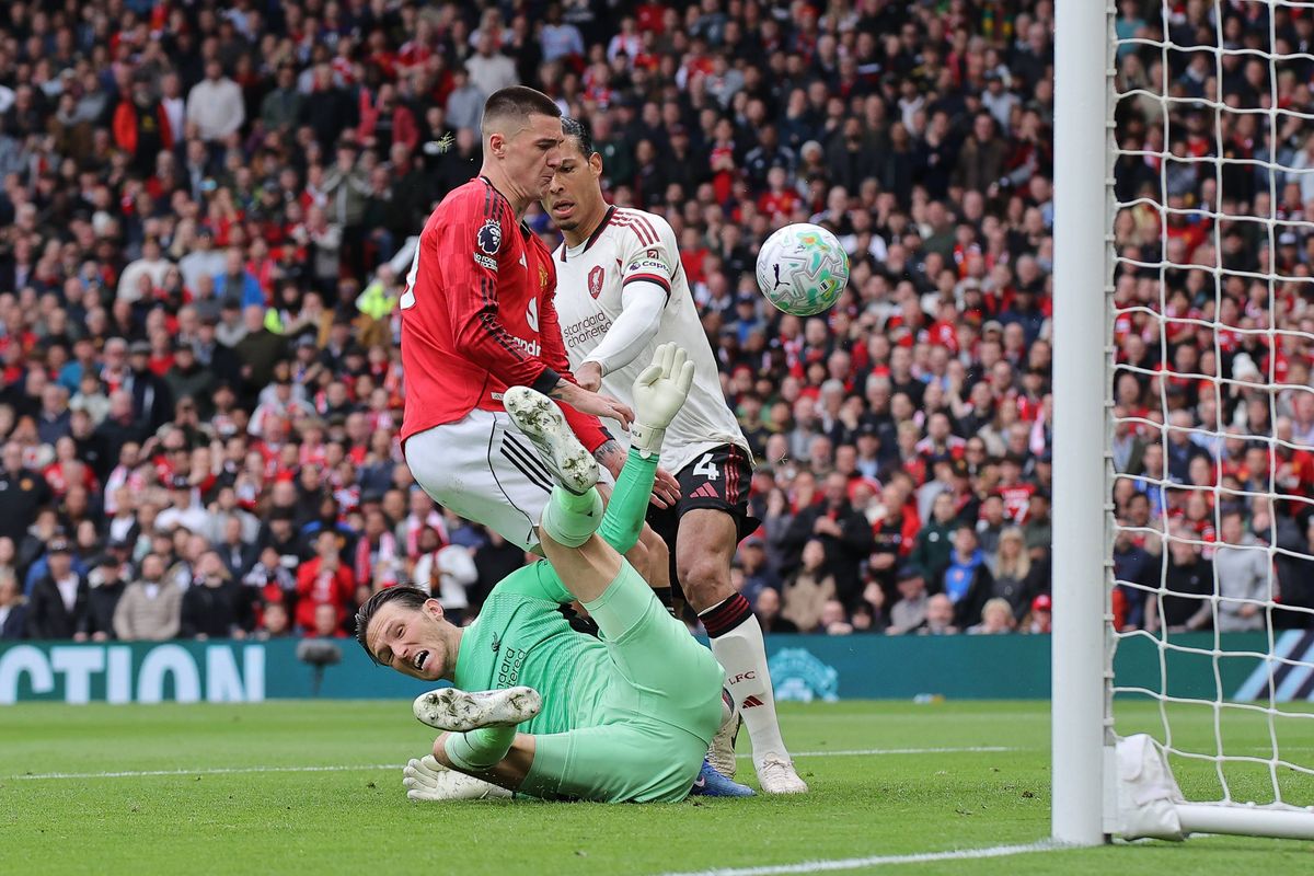 MANCHESTER, ENGLAND - MAY 03: Benjamin Sesko of Manchester United scores their side's second goal past Freddie Woodman of Liverpool during the Premier League match between Manchester United and Liverpool at Old Trafford on May 03, 2026 in Manchester, England. (Photo by James Gill - Danehouse/Getty Images)