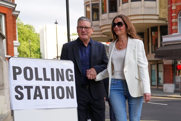 Britain's Prime Minister Keir Starmer and wife Victoria arrive at a polling station in central London, Thursday, May 7, 2026 to cast their votes in the local elections.(AP Photo/Kirsty Wigglesworth)