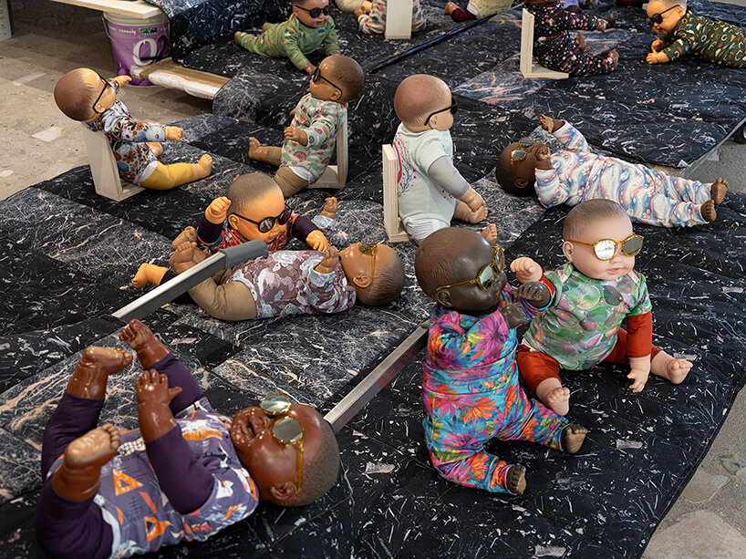 208 baby dolls animate japan pavilion in ei arakawa-nash's playful ode to care - 2