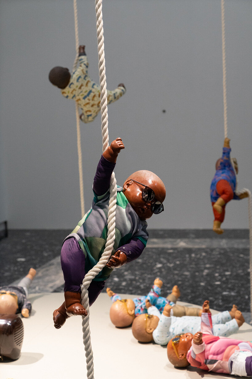 208 baby dolls animate japan pavilion in ei arakawa-nash's playful ode to care - 8