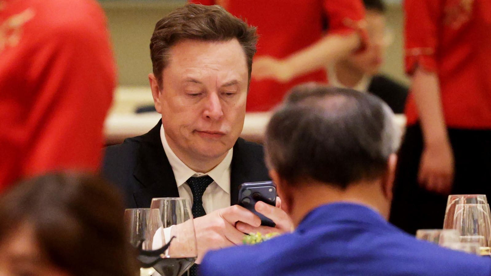 Elon Musk Takes Selfie With Rival Chinese EV Billionaire Lei Jun