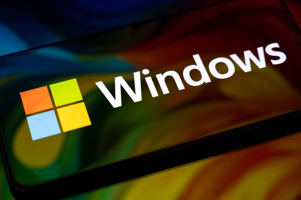 Windows logo appears on the screen of a smartphone.