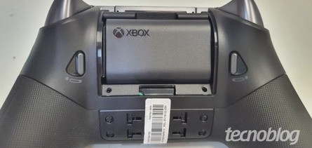 The left photo shows the scroll wheels, which could be used to adjust volume and game/chat mix, while the right photo reveals the rear of the device, including a removable rechargeable battery, lockable triggers and removable rear paddles. Click to enlarge. 